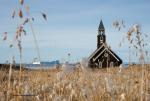 Wollgras mit Kirche