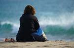 Die Unbekannte am Strand