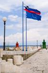 Flaggen am Pier von Piran